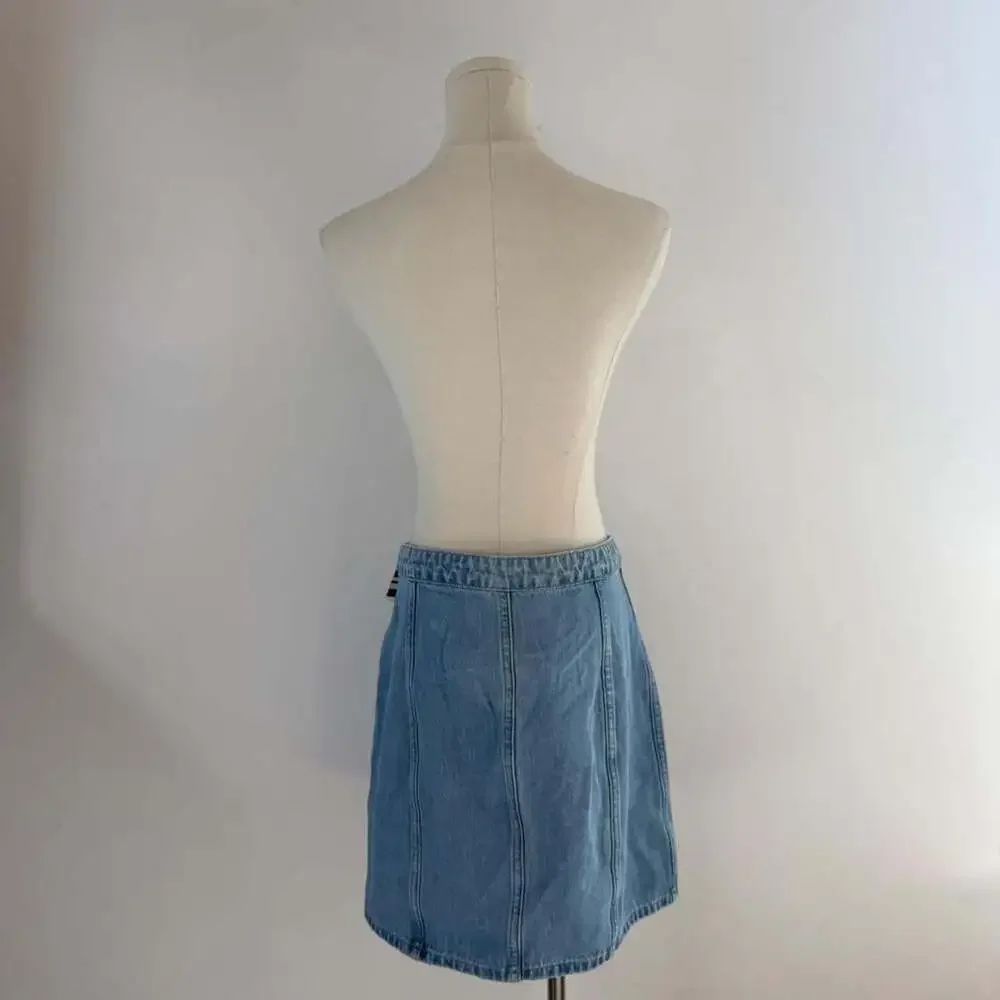 L'Agence Phia Seamed Button Front Mini Skirt | Light Wash Denim Concho Buttons |